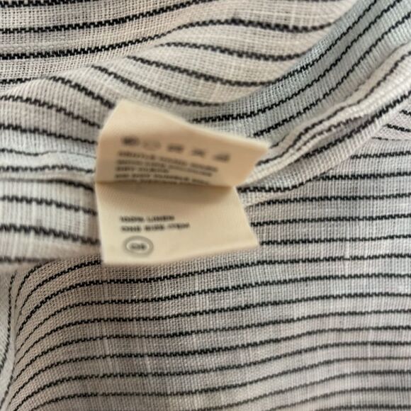 Elegant Ruffled Striped Mini Dress with Floral Details - Picture 7 of 9